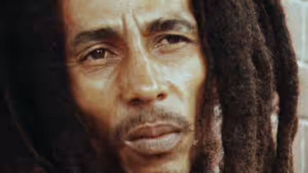 Bob Marley gazes forward, his face framed by long dreadlocks