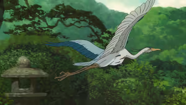 The Gray Heron glides above trees past a stone lantern in the forest