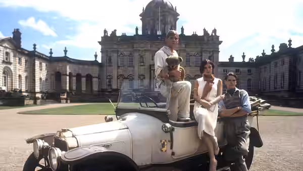 Three people with a teddy bear posed beside a vintage car in front of a large country house