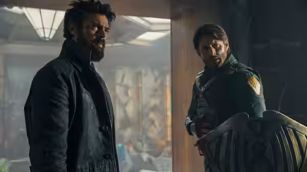 Billy Butcher and Hughie standing in an abandoned building