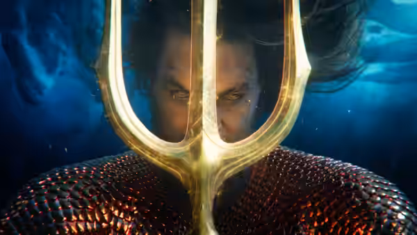 Arthur (Jason Momoa) glaring through his trident underwater