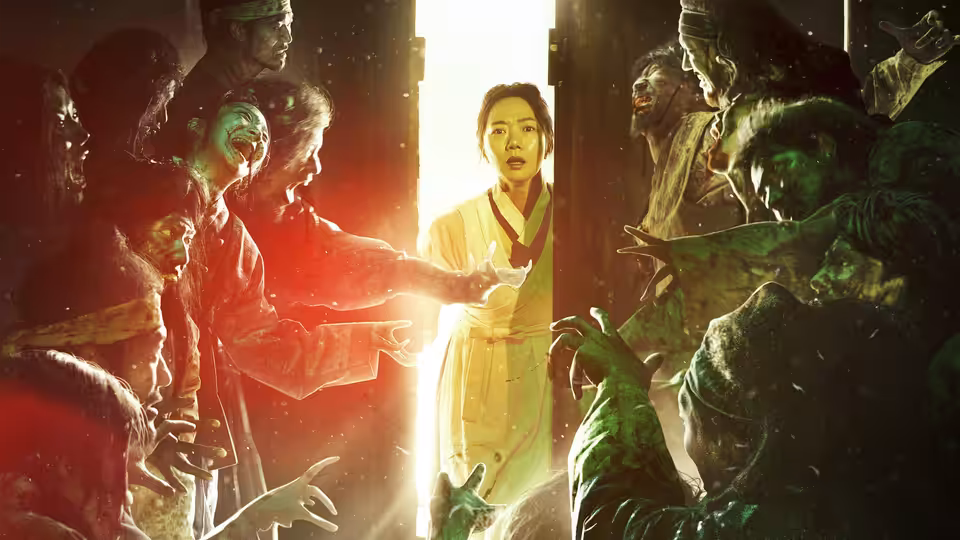 Woman in pale robe stands in bright doorway as zombies reach toward her