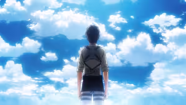 a lone figure stands facing a vast blue sky filled with clouds