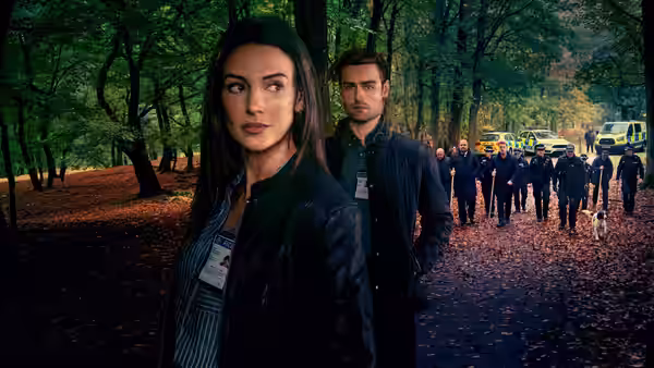 DI Emma Crane (Michelle Keegan) and DI Tom Radley (Douglas Booth) face officers in a forest