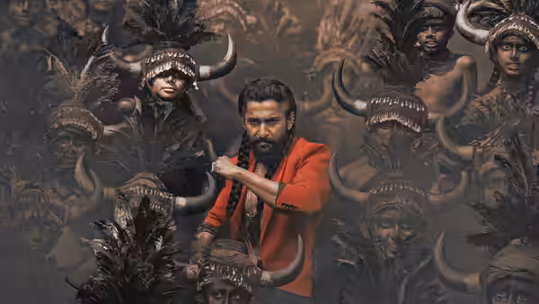 Sarakka ‘Jadal’ (Nani) raises an arm amid feather-adorned figures