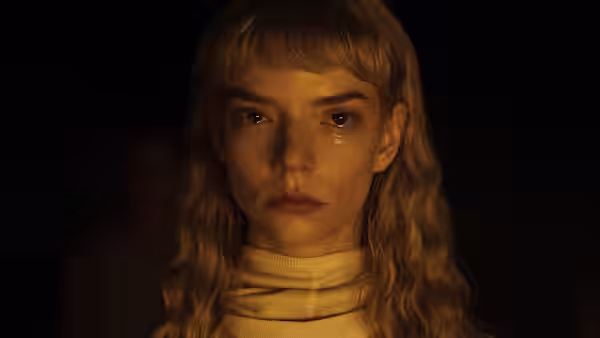 Joan (Anya Taylor-Joy) with tears streaming down her face in close-up