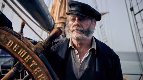 Captain Eliot (Liam Cunningham) at the wheel of the Demeter