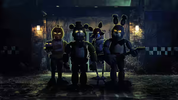 Four animatronic animals standing together in a dimly lit abandoned room