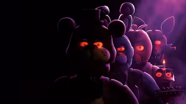 Several animatronic figures with glowing eyes gathered in a dark space