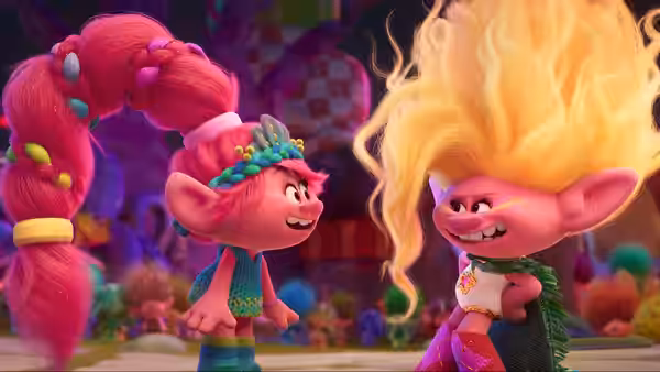 Viva (Camila Cabello) stands face to face with a yellow-haired troll in a colorful setting