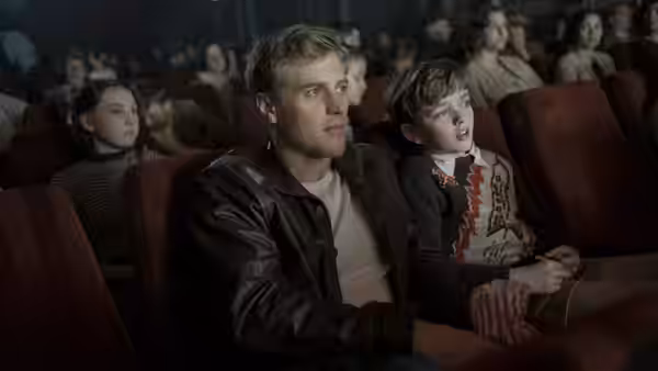 Rory Lomax (Johnny Flynn) watches a film in a cinema with Robert Pretty (Archie Barnes)