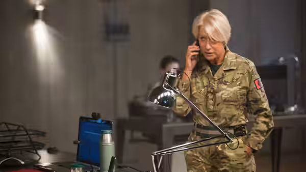 Colonel Katherine Powell (Helen Mirren) takes a phone call in a military operations room