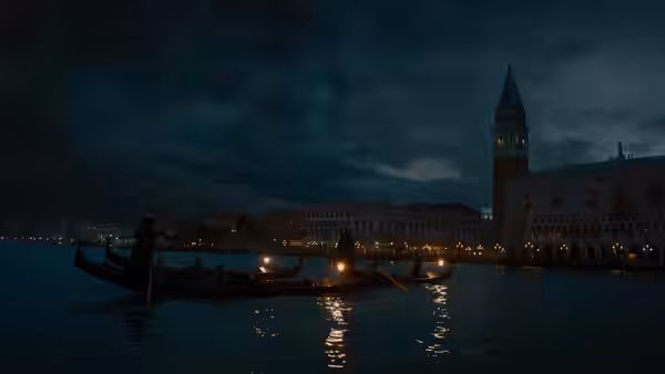 Gondolas crossing the water at night before a lit tower