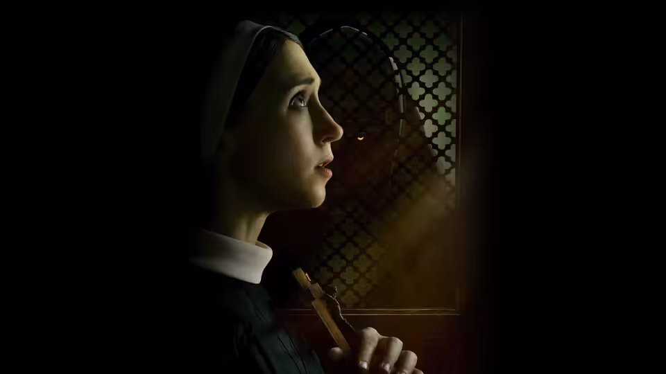 Sister Irene (Taissa Farmiga) holding a crucifix beside a latticed window