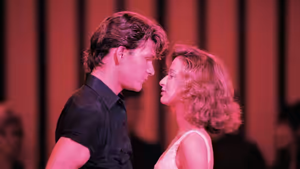 Johnny (Patrick Swayze) and Baby (Jennifer Grey) face to face in red light