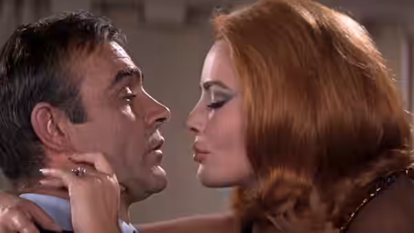 James Bond (Sean Connery) and Helga Brandt (Karin Dor) face to face in close embrace