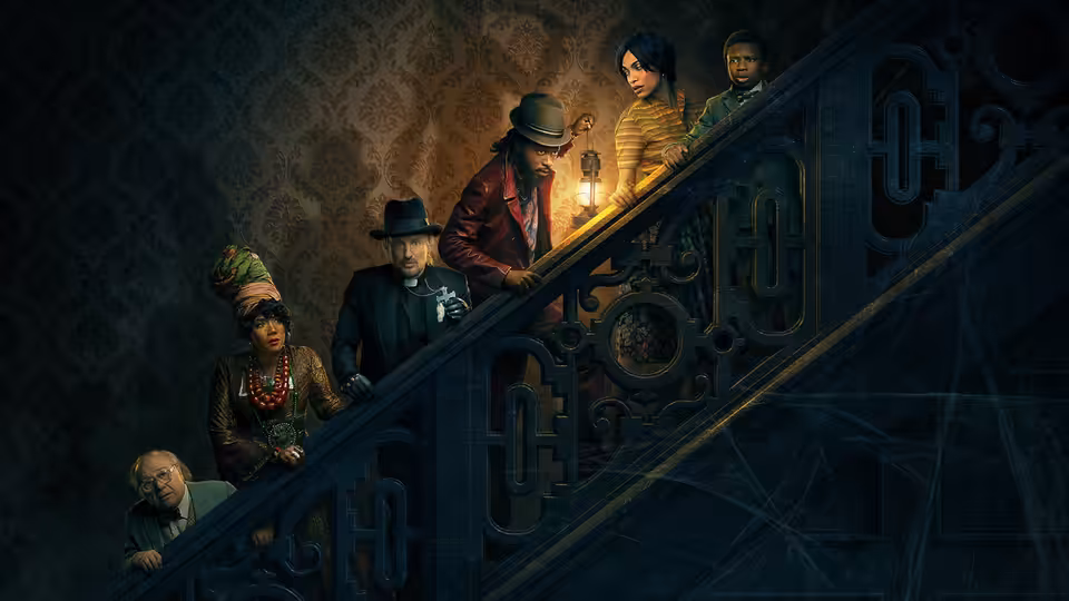Group of people climbing a dark ornate staircase with a lantern