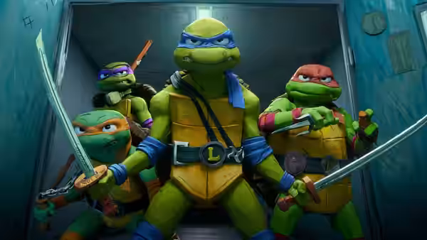 Four turtles in colorful masks stand ready with swords in a corridor
