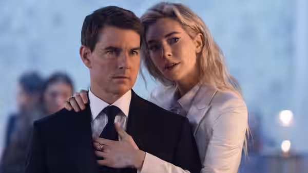 Ethan Hunt (Tom Cruise) with The White Widow (Vanessa Kirby) at a formal event
