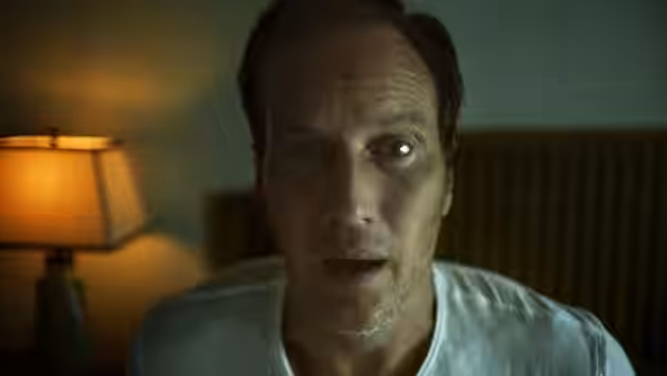 Josh Lambert (Patrick Wilson) lies in bed staring forward with wide eyes