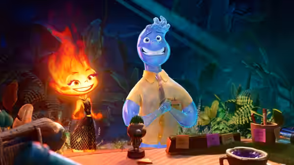 Ember (Leah Lewis) and Wade (Mamoudou Athie) smiling together in a plant shop