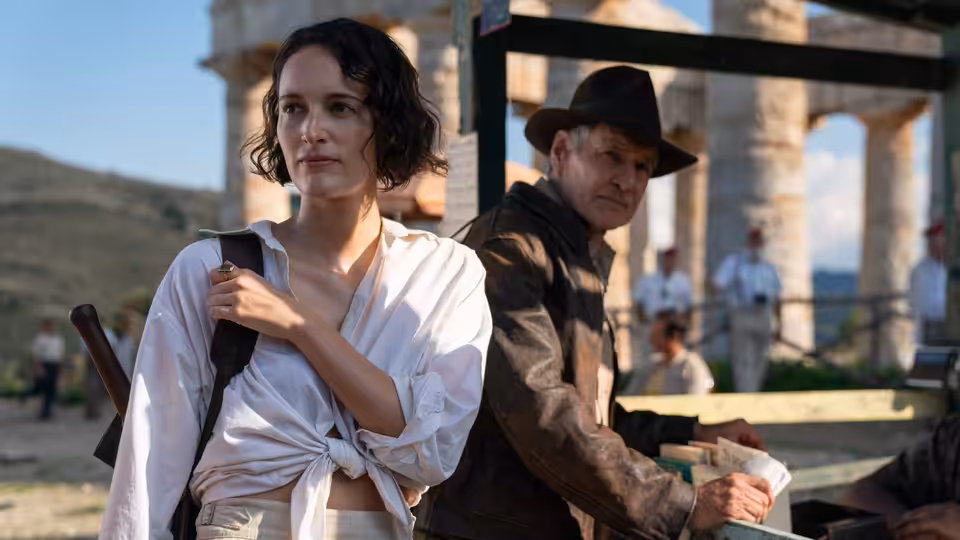 Helena (Phoebe Waller-Bridge) and Indiana Jones (Harrison Ford) among ancient stone columns