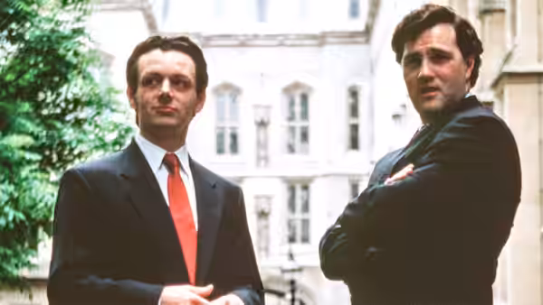 Tony Blair (Michael Sheen) and Gordon Brown (David Morrissey) stand in a courtyard