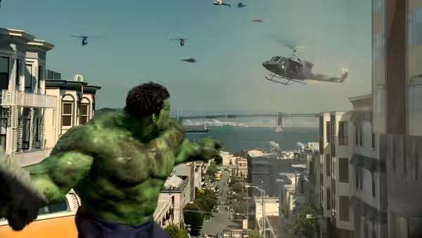 The Hulk hurls a vehicle toward helicopters above a city street
