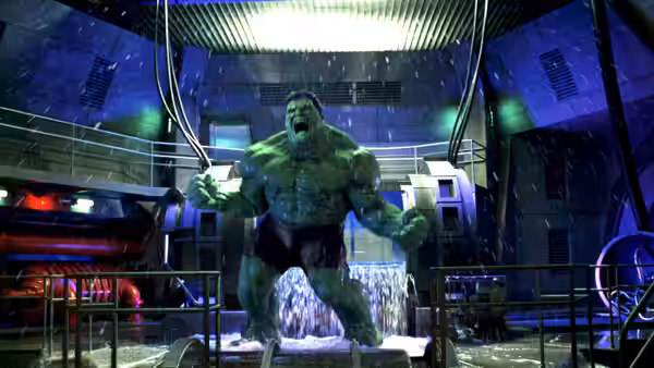 The Hulk roars amid water and machinery in a laboratory chamber