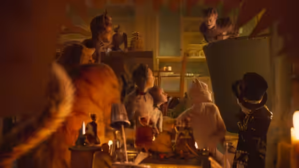 group of cats gathers inside a cluttered shop lit by candles