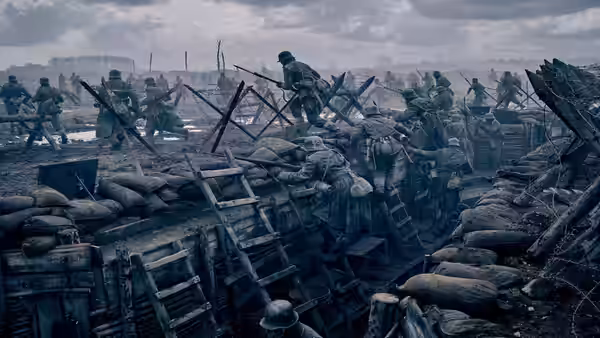Infantry climb over sandbags and barbed wire during a battlefield charge
