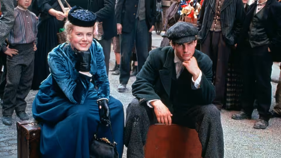 Shannon Christie and Joseph Donnelly sit among a crowd in town