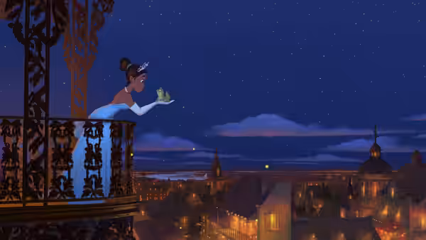 Tiana (Anika Noni Rose) on a balcony at night holding frog Naveen over a city