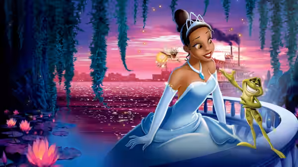 Tiana (Anika Noni Rose) in a blue gown on a boat with frog Naveen at dusk