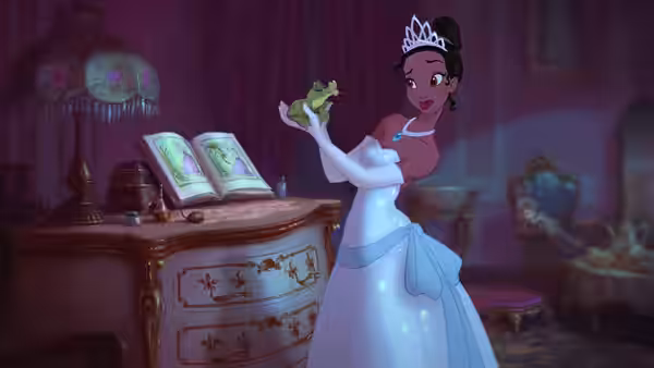 Tiana (Anika Noni Rose) in a white dress holding frog Naveen in a bedroom