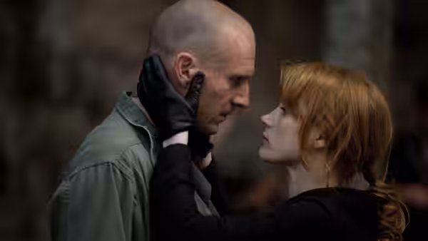 Coriolanus (Ralph Fiennes) and Virgilia (Jessica Chastain) share an intense close embrace