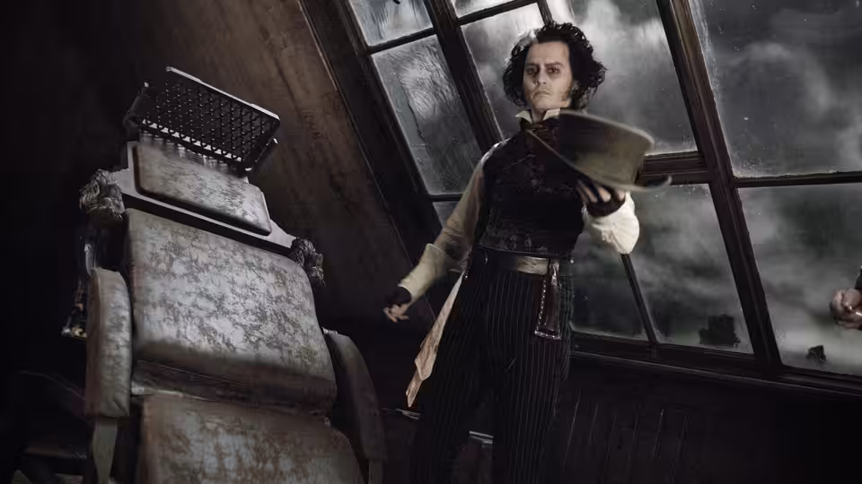 Sweeney Todd (Johnny Depp) holding a razor in his barber shop