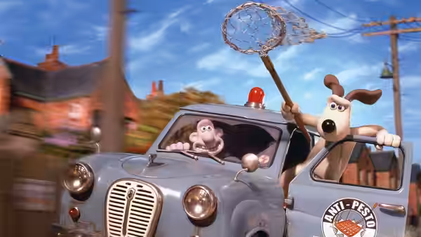 Wallace and Gromit racing in their van while holding a large net