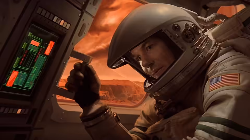 Astronaut in white spacesuit operates controls inside spacecraft overlooking Mars