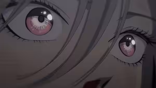 Close-up of wide pink eyes framed by silver hair strands and dark lashes