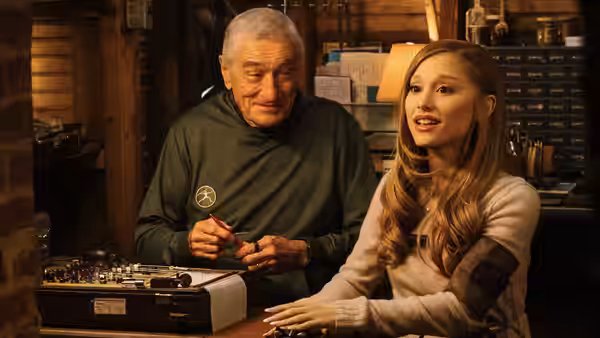 Jack Byrnes (Robert De Niro) and Olivia Jones (Ariana Grande) at a control desk