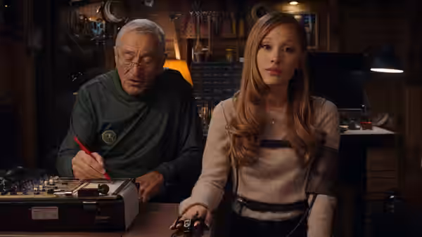 Jack Byrnes (Robert De Niro) and Olivia Jones (Ariana Grande) using electronic controls