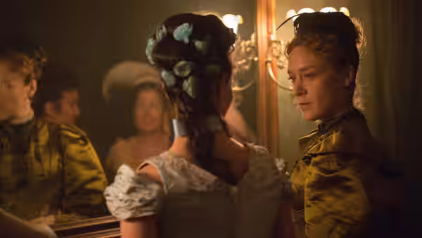 Bridget Sullivan (Kristen Stewart) faces Lizzie Borden in a candlelit room
