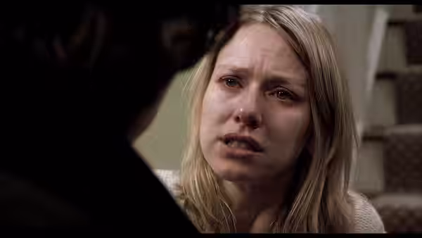 Cristina Peck (Naomi Watts) with tears on her face