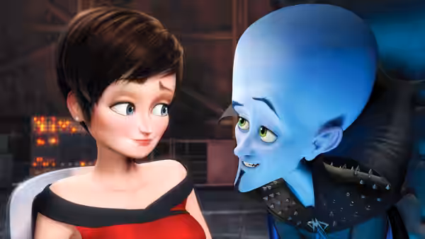 Megamind (Will Ferrell) leans toward Roxanne Ritchi (Tina Fey) in a warmly lit room