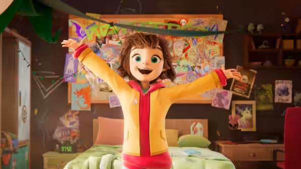 Excited girl in yellow jacket spreading arms wide inside decorated bedroom