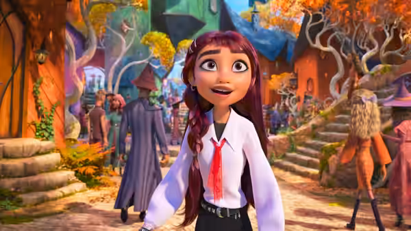 Billie Doe (Hailee Steinfeld) standing surprised in a colorful fantasy village street