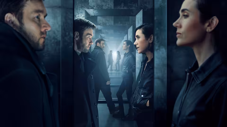 Joel Edgerton faces Jennifer Connelly in a dimly lit concrete corridor