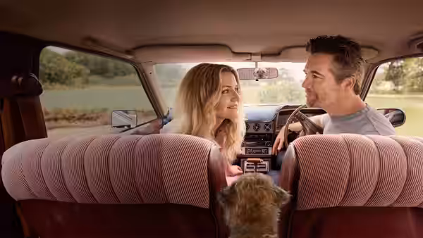 Ashley (Harriet Dyer) and Gordon (Patrick Brammall) in a car with their dog