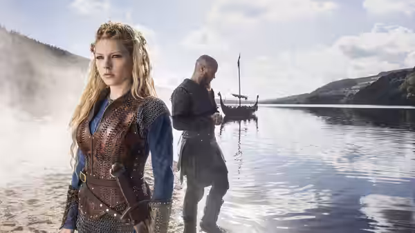 Lagertha (Katheryn Winnick) on a misty shore beside a longship